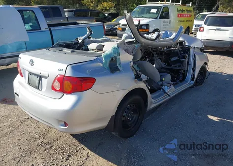 2009 Toyota Corolla Le из США, поврежденный, VIN 1NXBU40E59Z112648